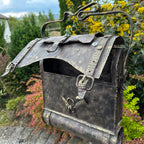 Briefkasten „Postbotentasche”